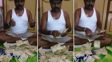 Đại gia hút tiền bằng tay như siêu nhân gây choáng