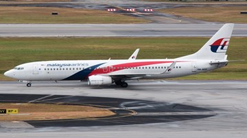 Động cơ bốc cháy, máy bay Malaysia Airlines hạ cánh khẩn cấp
