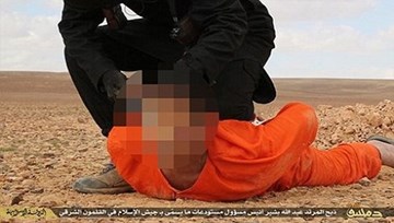 IS công bố hình ảnh một tù nhân bị chặt đầu dã man