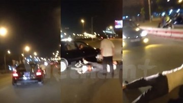 Xe biển xanh và xe máy “vờn” nhau trên cầu Thanh Trì