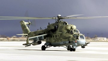 Mục sở thị “xe tăng bay” Mi-24 bảo vệ căn cứ Nga ở Syria