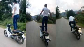 Triệu tập thanh niên đứng dang tay điểu khiển xe máy