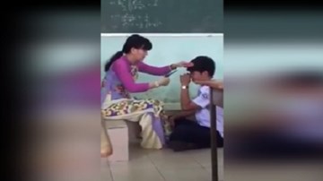 Xôn xao clip cô giáo cầm kéo cắt tóc nam sinh trong lớp học