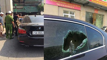 Hà Nội: CSGT phá cửa, cứu tài xế ngất lịm trong xe BMW