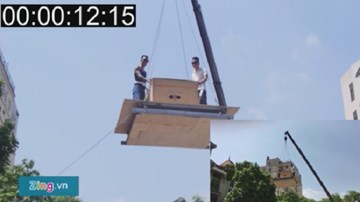 Màn ảo thuật khóa tay thoát khỏi thùng gỗ rơi từ độ cao 5 m