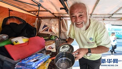 Cụ ông đạp xe từ Trung Quốc sang Brazil... xem Olympic