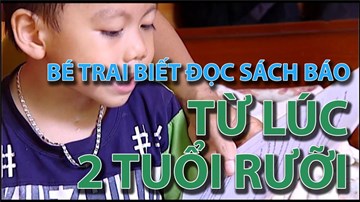 Bé trai biết đọc sách báo từ lúc 2 tuổi rưỡi