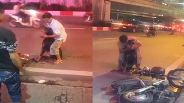 Người chủ ôm chú chó Doberman bị trọng thương gào thét giữa đường phố Hà Nội
