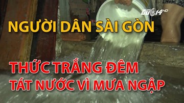 Người dân thức trắng đêm tát nước sau trận mưa ngập lịch sử