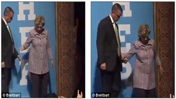 Bà Clinton ho sù sụ, phải nhờ mật vụ dìu xuống khán đài