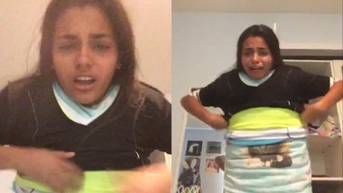 Cô gái khóc òa vì mặc 100 chiếc áo lên người mà không cởi ra được