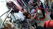 Bà cụ U70 vào shop quần áo trộm đồ, giấu dưới nón
