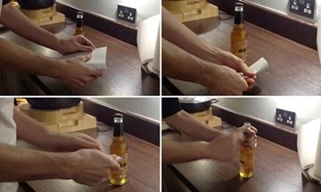 Tuyệt chiêu mở nắp bia bằng... tờ giấy A4
