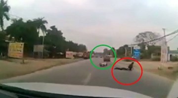 Ô tô ép ngã người đi đường rồi bỏ chạy