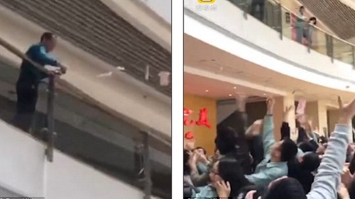 Sếp rải “mưa tiền” mừng tuổi nhân viên ngày đầu năm