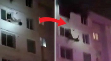 Cô gái TQ rớt lầu, giữa chừng lính cứu hỏa vươn tay tóm