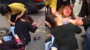 Sau va chạm giao thông, hai cô gái trẻ lao vào đánh nhau giữa phố Hà Nội