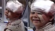 Dân mạng bật khóc trước clip cô bé Syria mặt rớm máu vẫn mỉm cười
