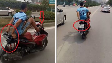 Lái xe máy bằng chân, đi vào làn BRT khiến người đi đường kinh hãi