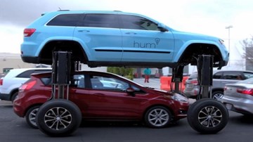 Xe hơi tự nâng cao bánh 3 m để chống tắc đường