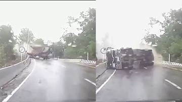 Ô tô tải lật ngang, suýt nghiền nát người đi xe máy