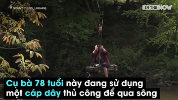 Ukraine: Cụ bà 78 tuổi đu dây vượt sông như 'siêu nhân'