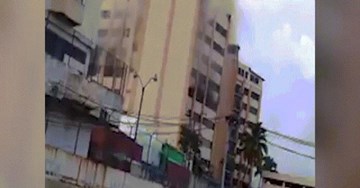 Nhảy từ đỉnh tòa nhà 9 tầng đang cháy để tự cứu mình