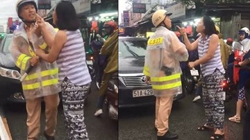 Người phụ nữ thóa mạ, giằng co với CSGT trên phố Sài Gòn