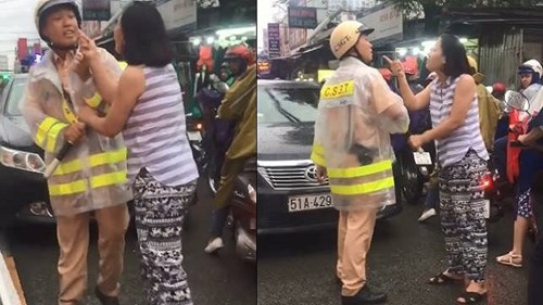 Người phụ nữ thóa mạ, giằng co với CSGT trên phố Sài Gòn