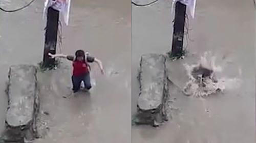 Đường ngập, cô gái Nepal đang đi bị miệng cống nuốt chửng
