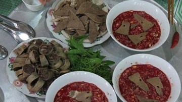 Mắc liên cầu lợn suýt chết do ăn lòng heo