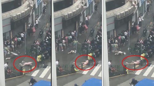 Bão cấp 10 ở Hong Kong thổi bay người trên phố