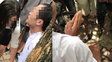Nghi vợ ngoại tình, chồng giật điện thoại bị vợ hô cướp cho mọi người đánh