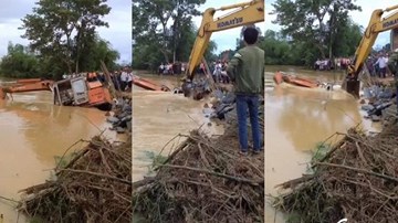 Cận cảnh ném cả máy múc hàng trăm triệu xuống hàn đê, cứu dân