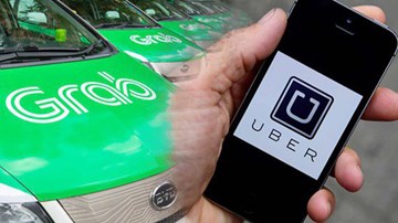 Bộ Giao thông yêu cầu xe Uber, Grab dán logo: Tài xế nói gì?