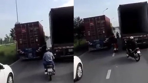 Hai xe container dàn hàng ngang, chạy như 