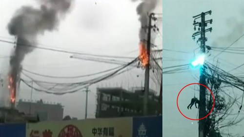 Treo mình trên cột điện bốc cháy ngùn ngụt ở Trung Quốc