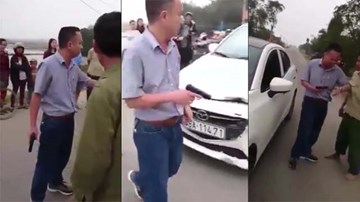 Lái ô tô đâm xe máy ven đường còn rút súng dọa bắn