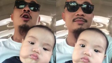 Bố trẻ chế nhạc dỗ con nhưng cậu bé quyết giữ gương mặt 'lạnh như tiền'