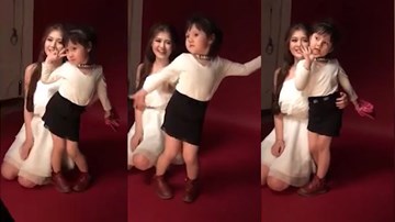 Bé gái tạo dáng chụp ảnh 
