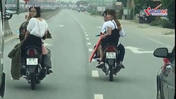 Đoàn rước dâu không mũ bảo hiểm, đi dàn hàng trên đường quốc lộ