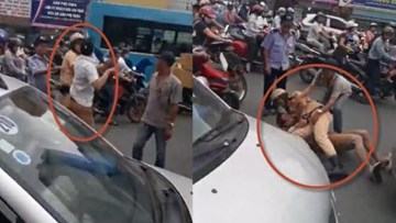 Hà Nội: Cảnh sát giao thông quật ngã lái xe taxi giữa phố