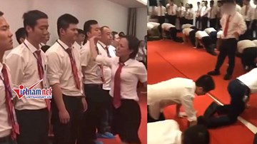 Nữ quản lý bắt nhân viên xếp hàng để tát và ép bò trên sàn