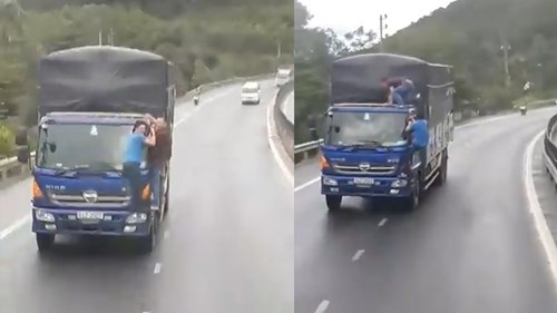 Huế: Hai người đàn ông đánh đu trên đầu xe tải