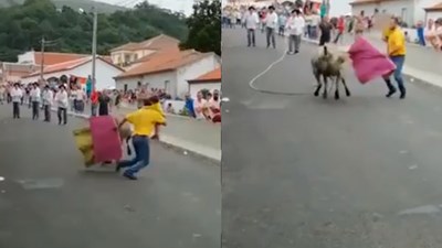 Ông bố liều lĩnh vừa bế con vừa đấu bò tót giữa phố