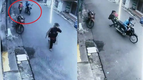 Giằng co với tên cướp khi đang bế con, người phụ nữ trượt gối dưới đường