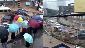 Bất lực nhìn hàng loạt ô tô trôi lềnh bềnh theo dòng lũ