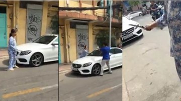 Người phụ nữ cầm dao, búa đập nát xe sang vì đậu trước cửa nhà