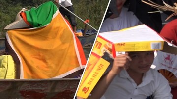 Người dân trùm áo, đội bìa các-tông trẩy hội chùa Hương