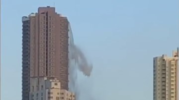 Thác nước khổng lồ đổ xuống từ cao ốc sau trận động đất